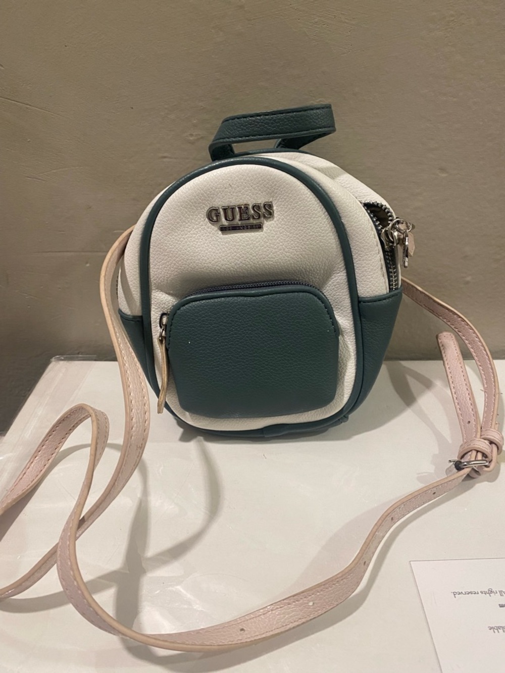 GUESS White and Green Mini Backpack with Pale Pink Strap